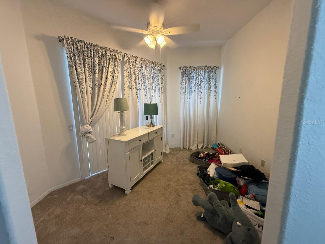 small room off the primary bedroom  perfect for baby nursery or office