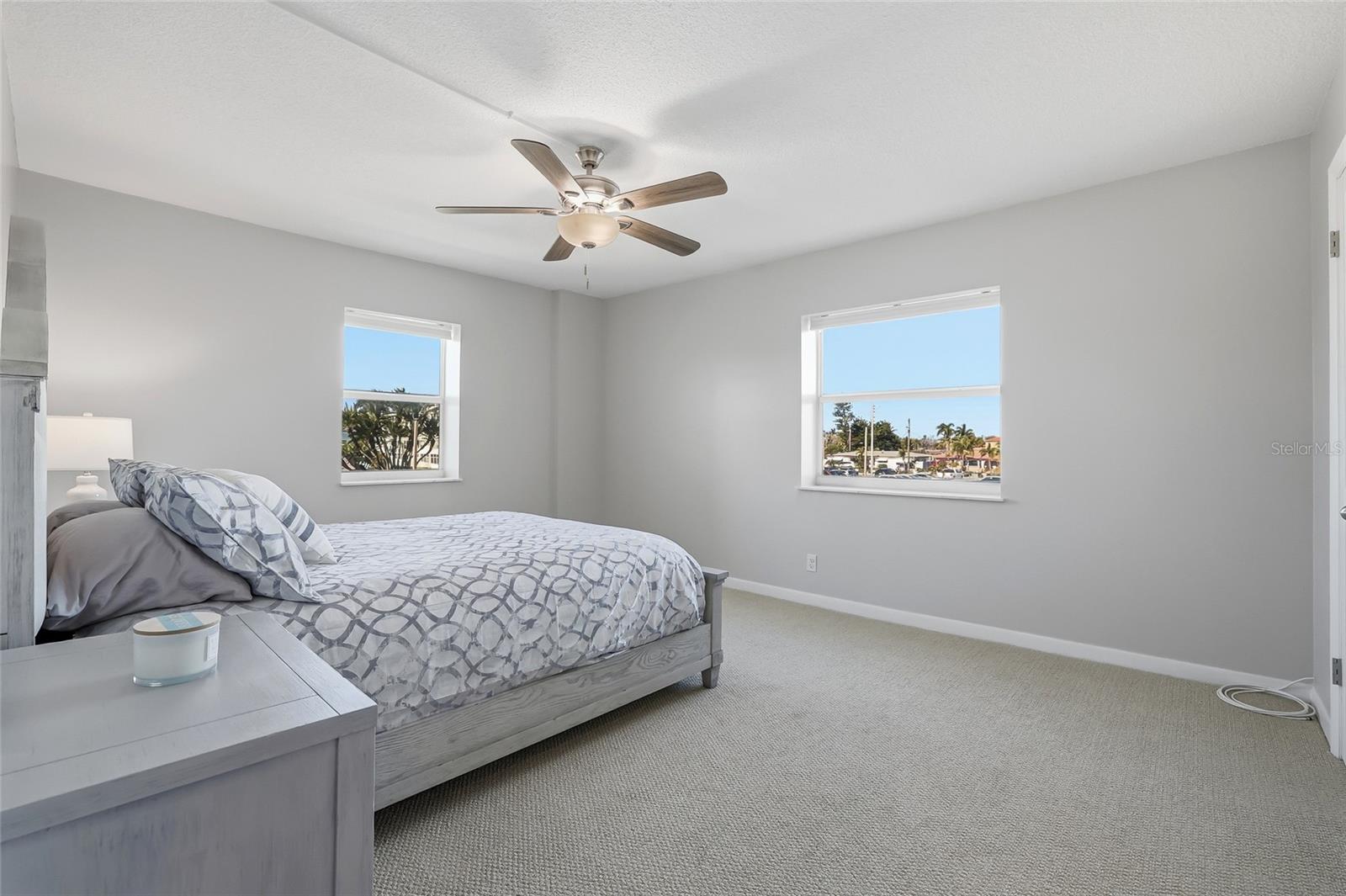Primary bedroom with 2 windows provides plenty of light.