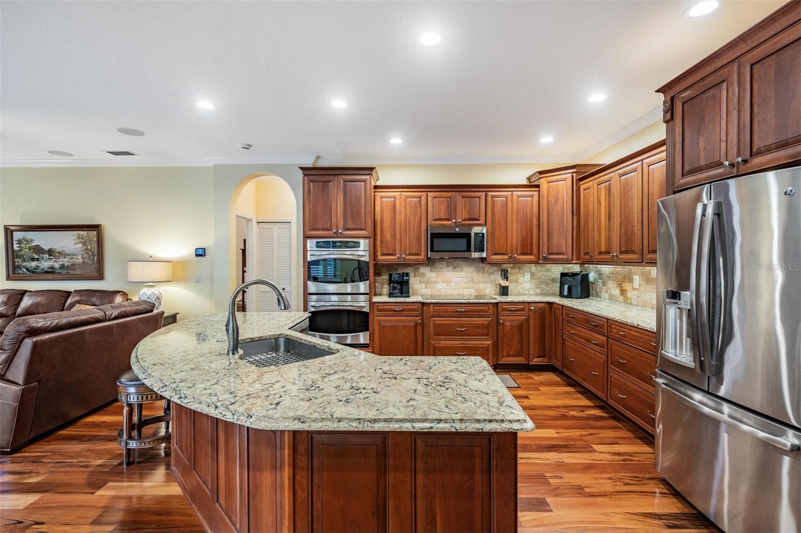 Kitchen with cherry cabinets.