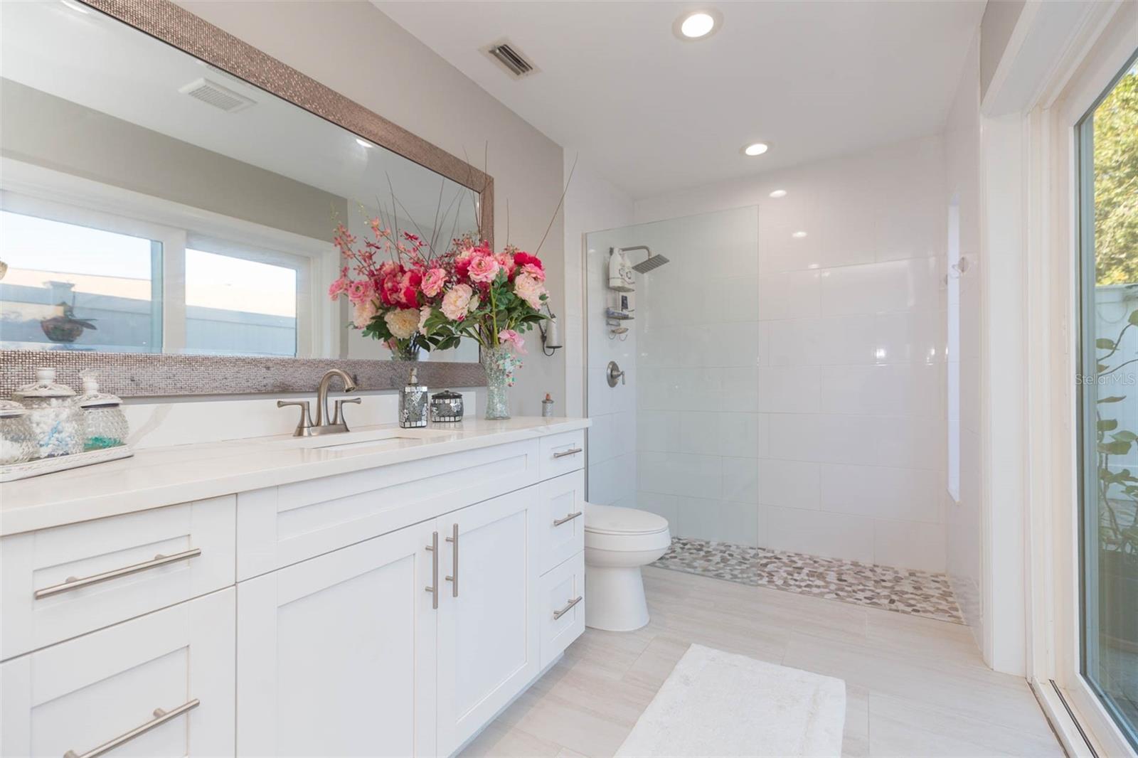 Primary Bathroom with private courtyard access