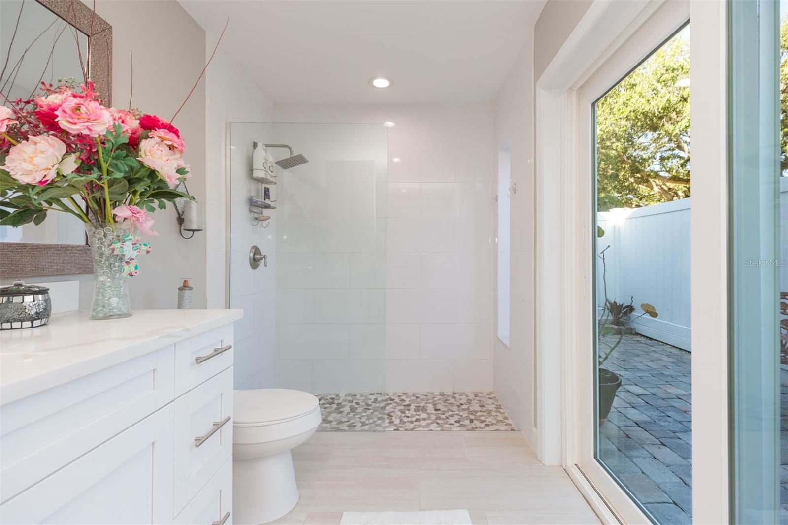Primary Bathroom with private courtyard access