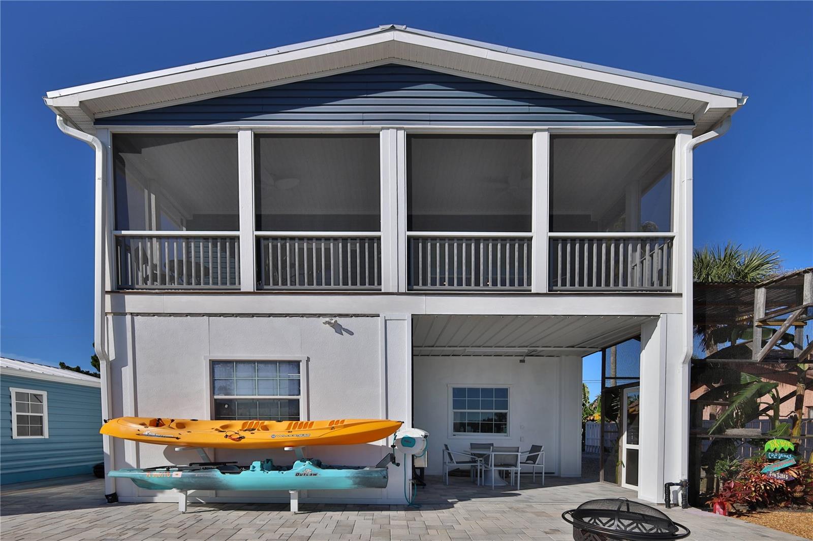 Back of Home with Covered Porch