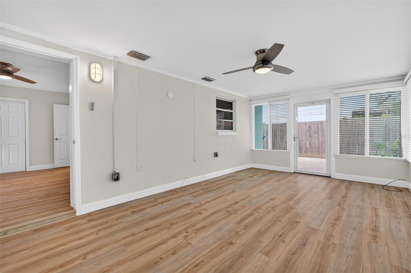 Enclosed Sunroom w/Half Bath and Laundry