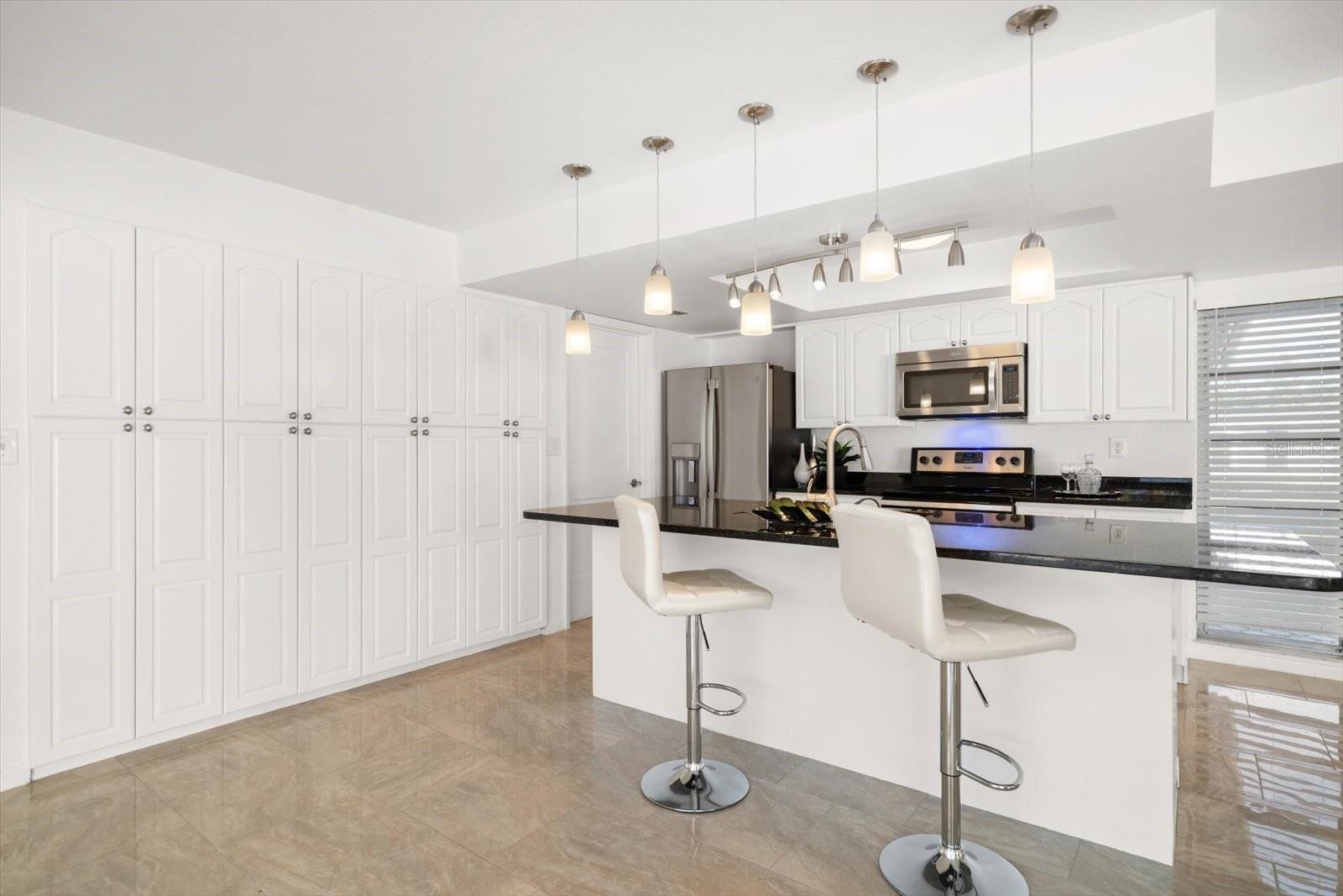 The kitchen has lots of storage, appreciated by any chef!