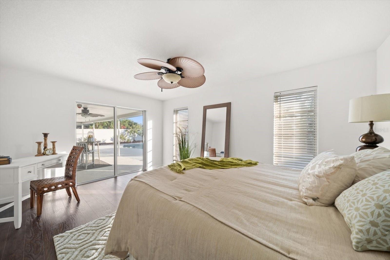 Primary bedroom with attractive flooring
