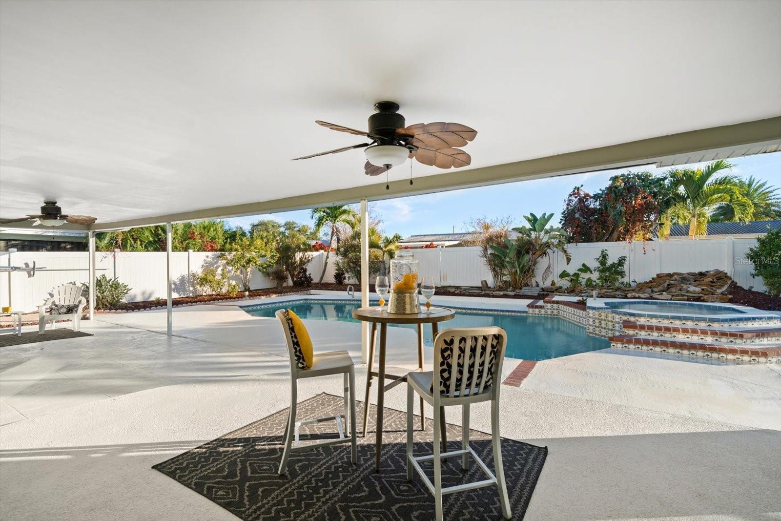 Shaded lanai, with view of private pool area.