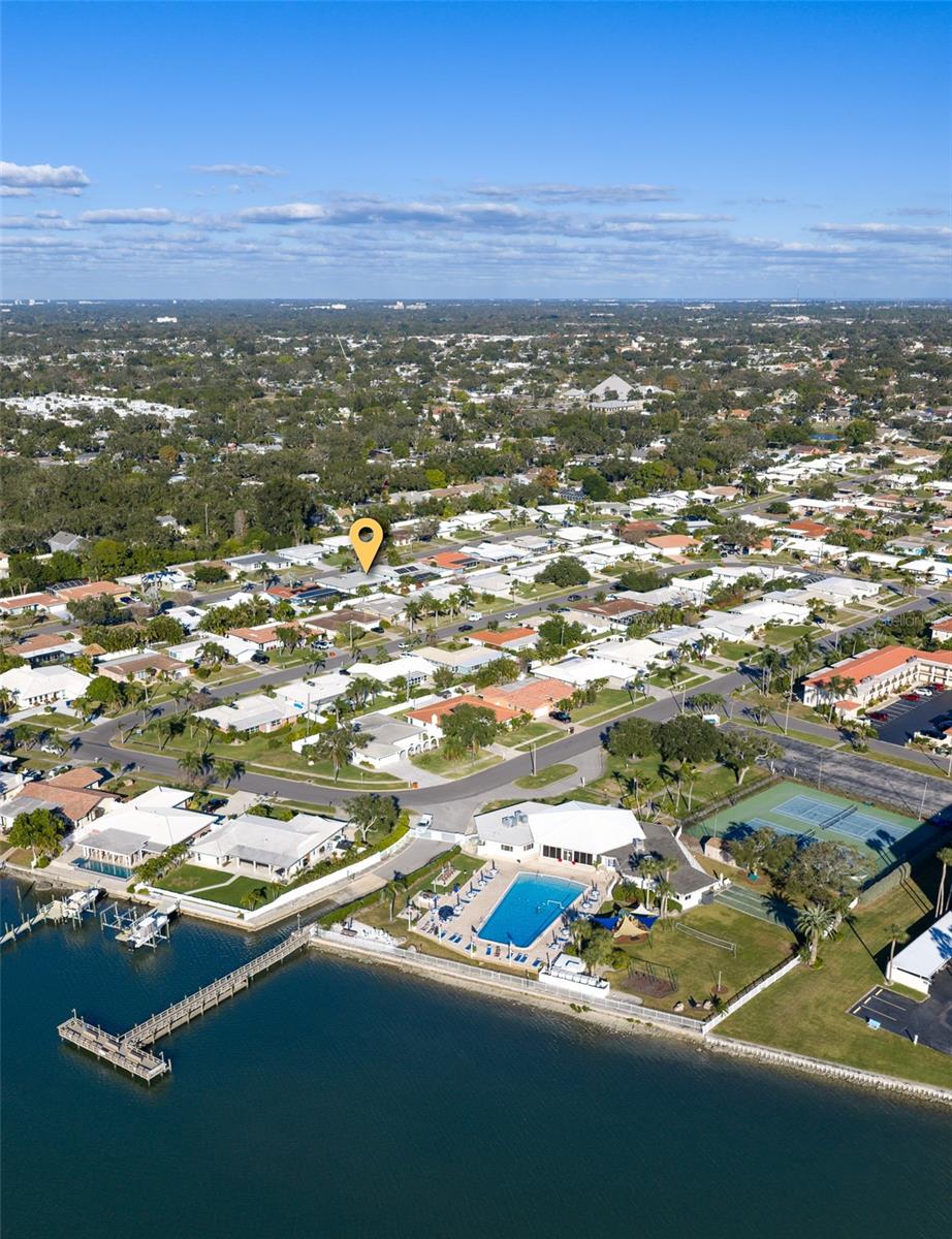 Short walk to community center with clubhouse, exercise facility, tennis pickleball, dock and pool!