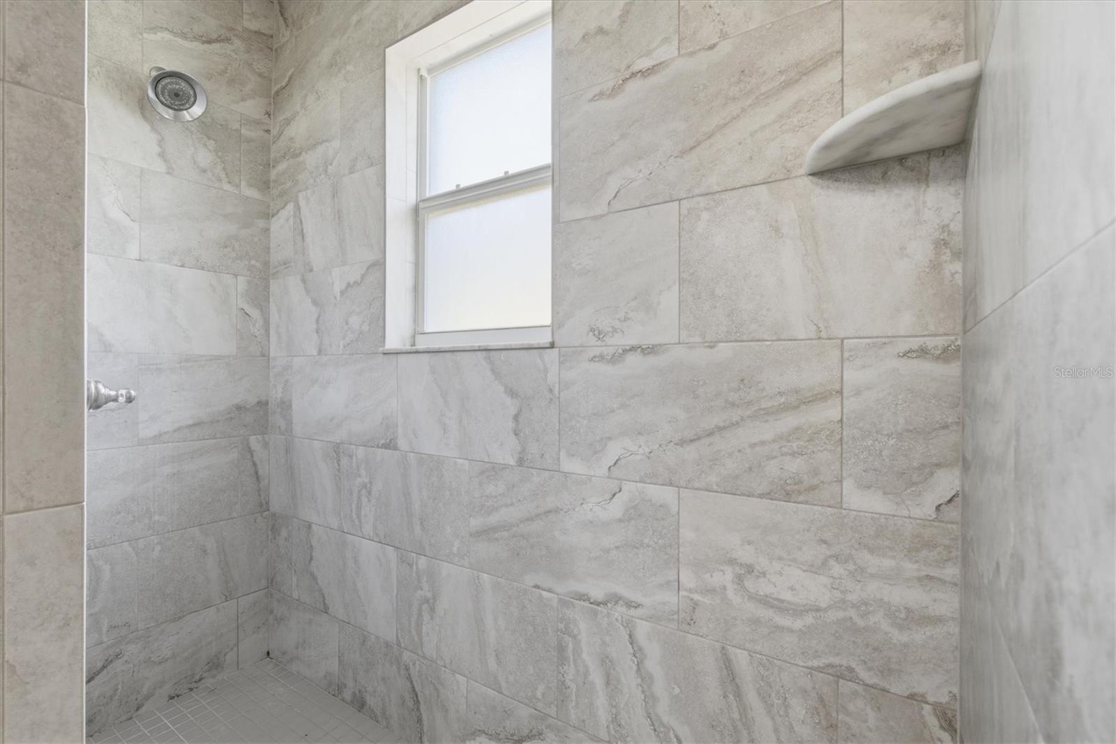 Walk in Shower with Marble Looking Tile