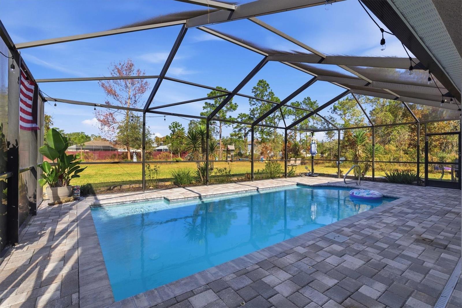 Screened Beautiful Pool with Pavers & Seat