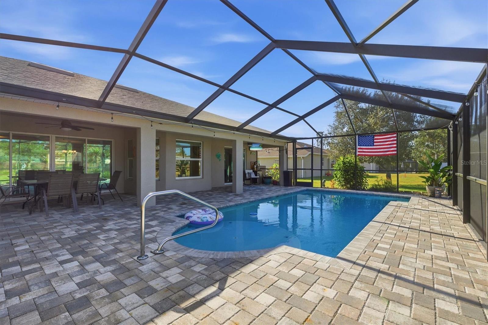 Screened Beautiful Pool with Pavers & Seat