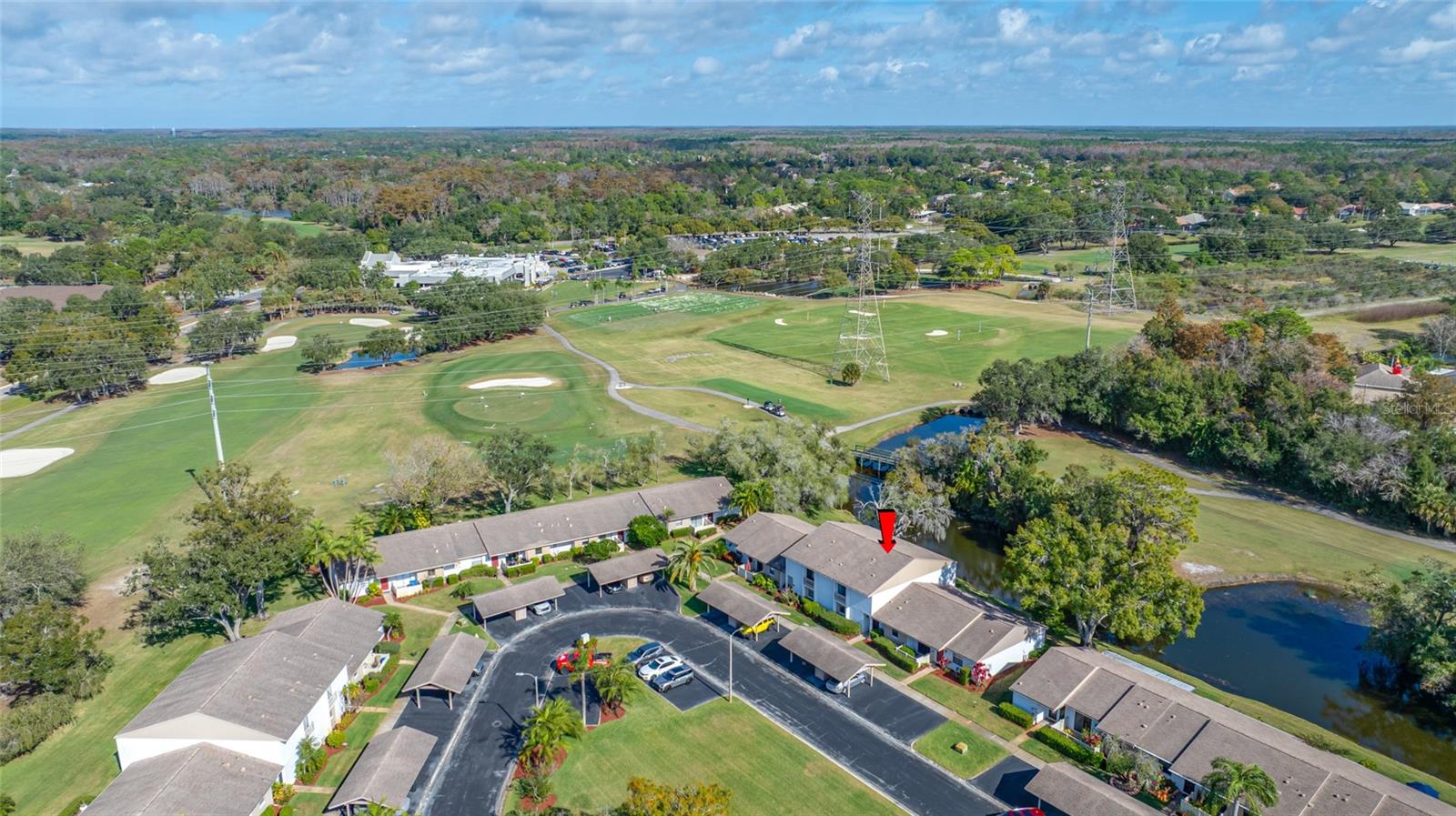 140 MICHAELS CIR OLDSMAR, FL 34677 - Looking North East
