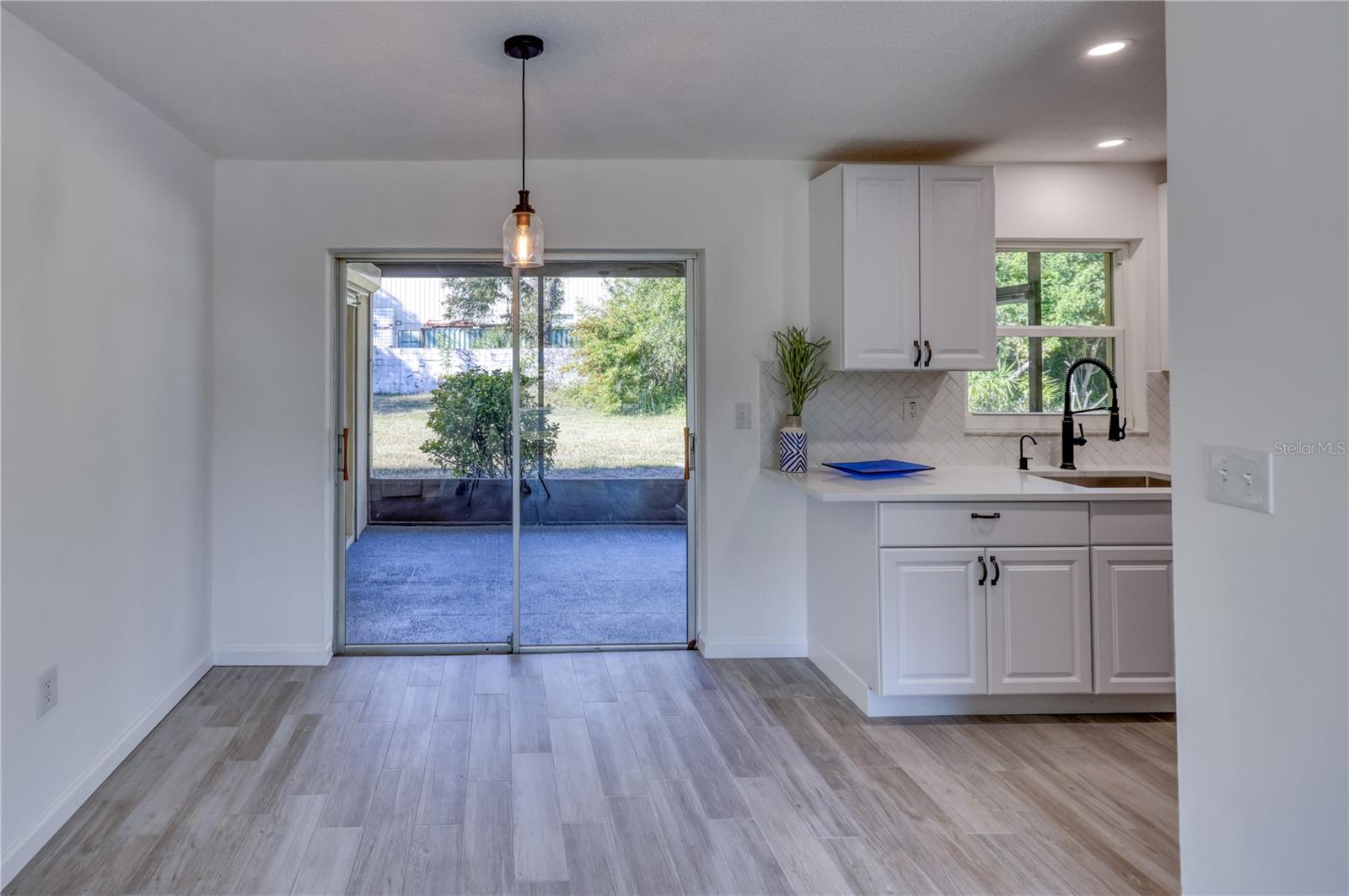 Double Slider Opens to Screened in Lanai