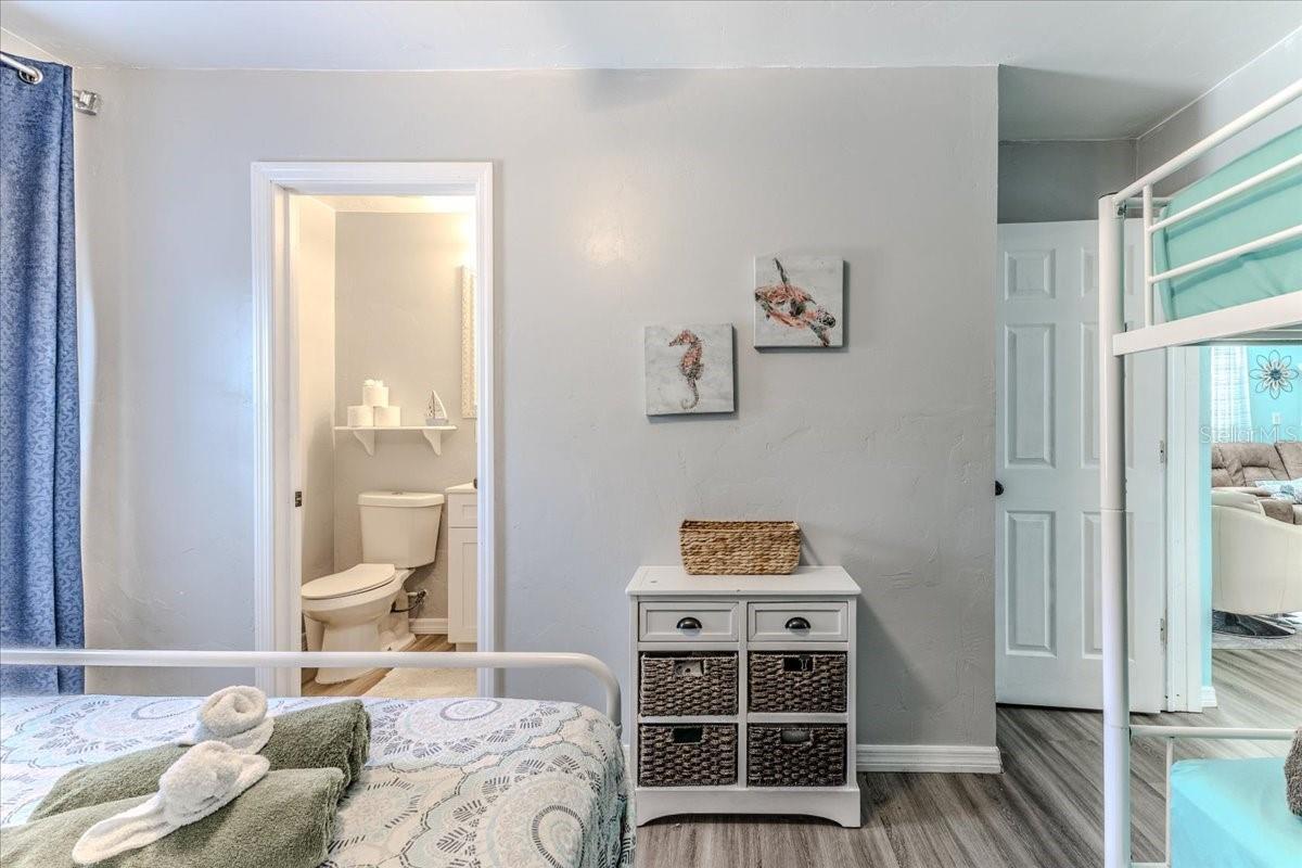 Bedroom to 1/2 Bathroom