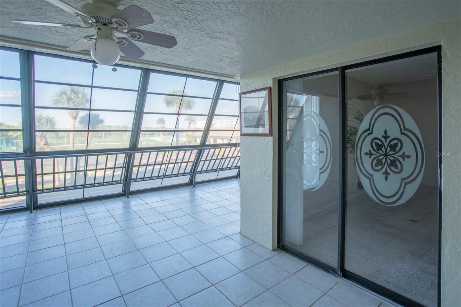 First Covered Area 12 X 8 w/Sliders From Liv. Rm & Primary BR