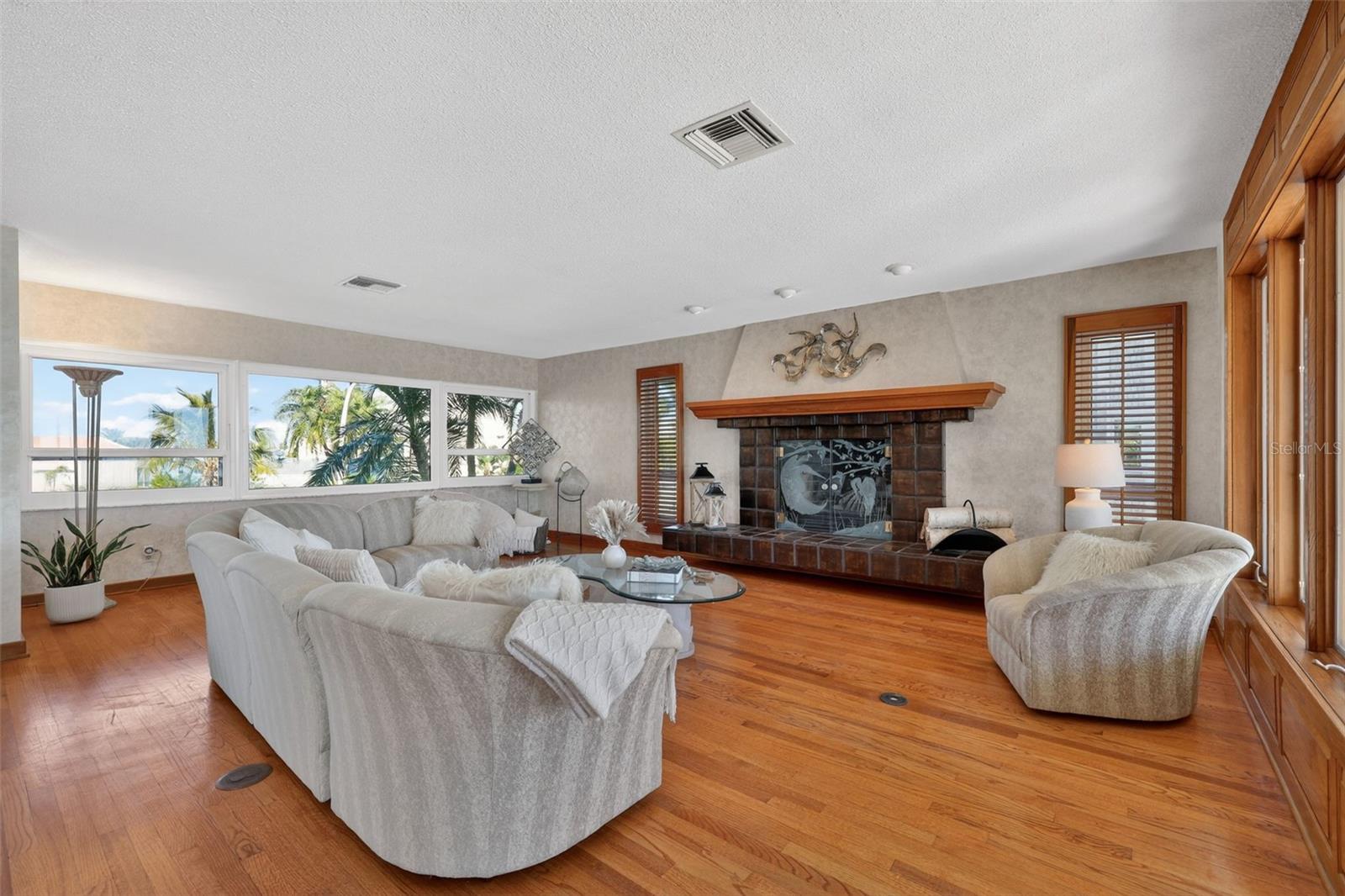 Living Room with Wood Burning Fireplace