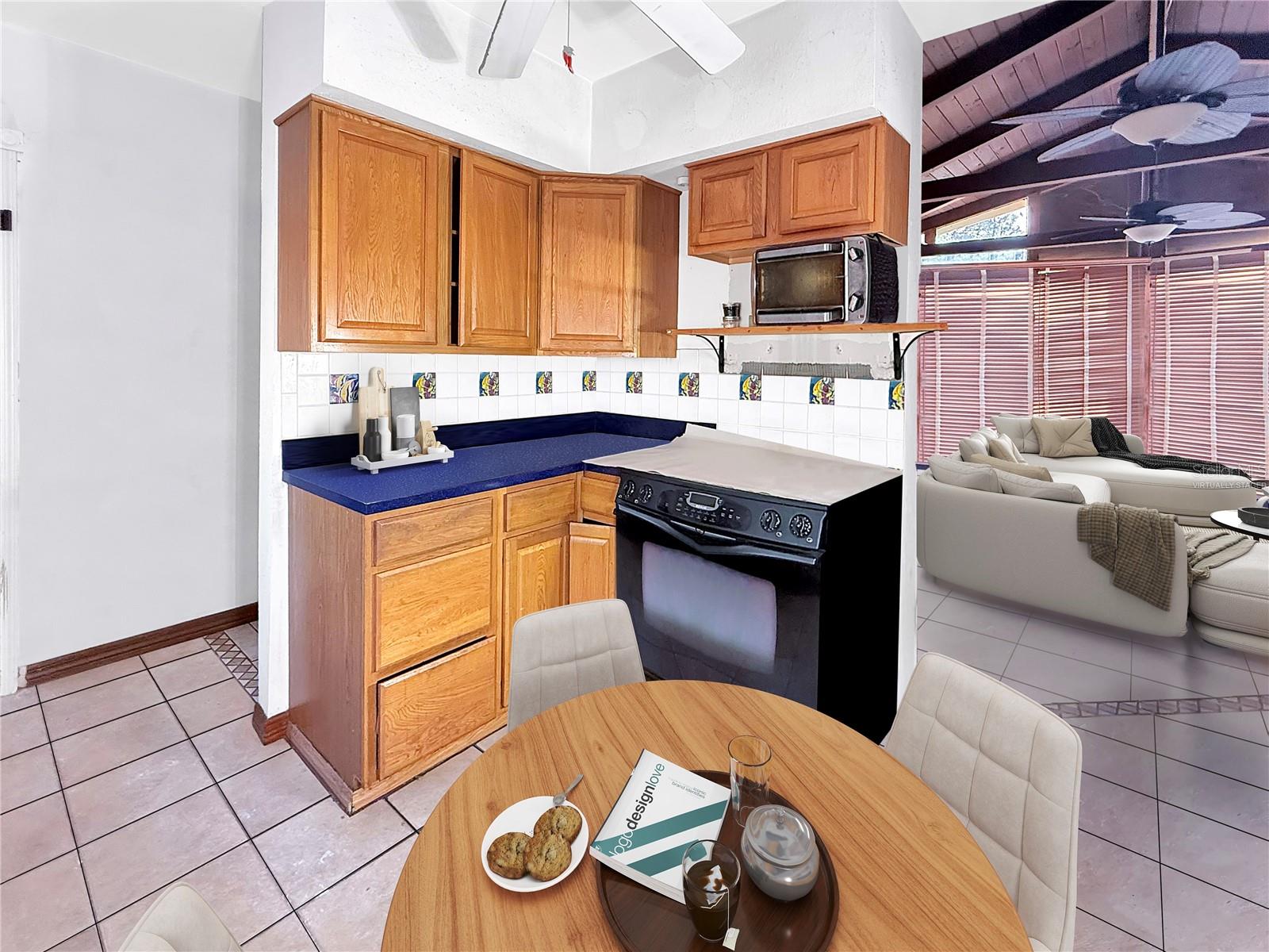 Kitchen located in the heart of the home-Virtually Staged