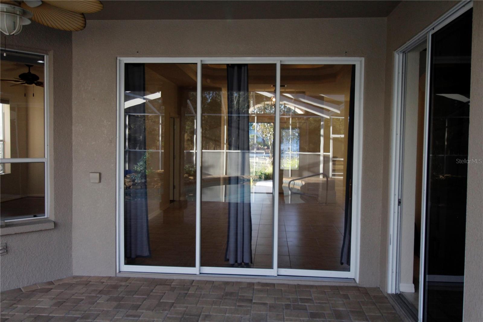 Sliding doors leading to Living room