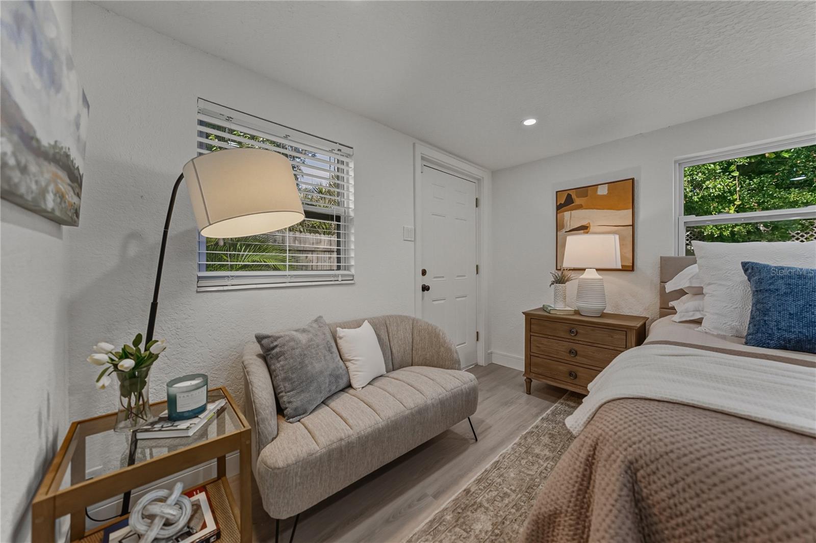 Primary Suite Sitting Area and Access to the Backyard