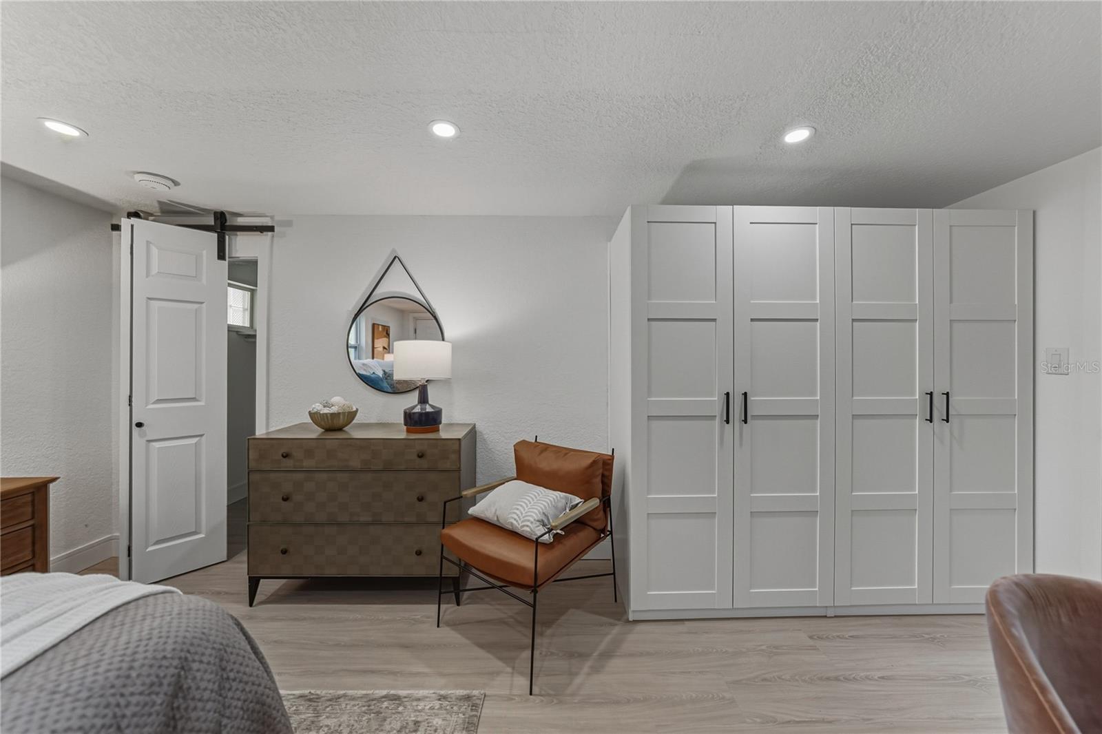 Primary Suite Walk In Closet and Dual Built In  Closets