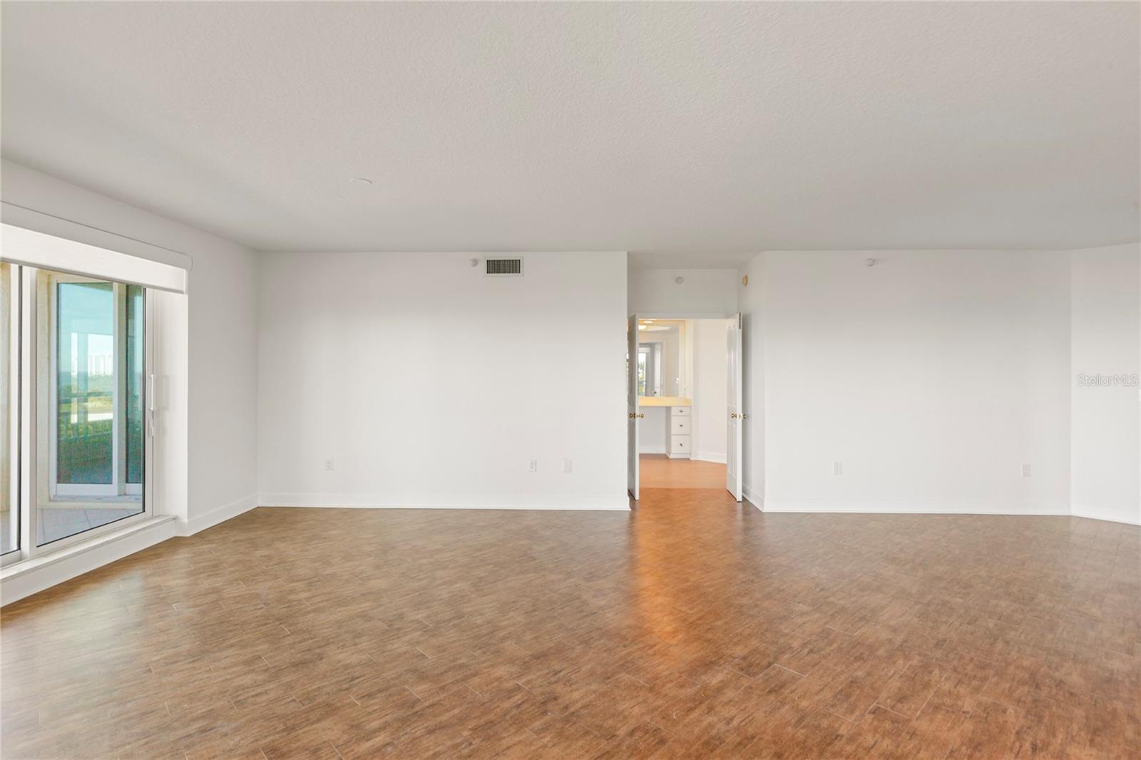 View thru the double doors into the Primary Suite