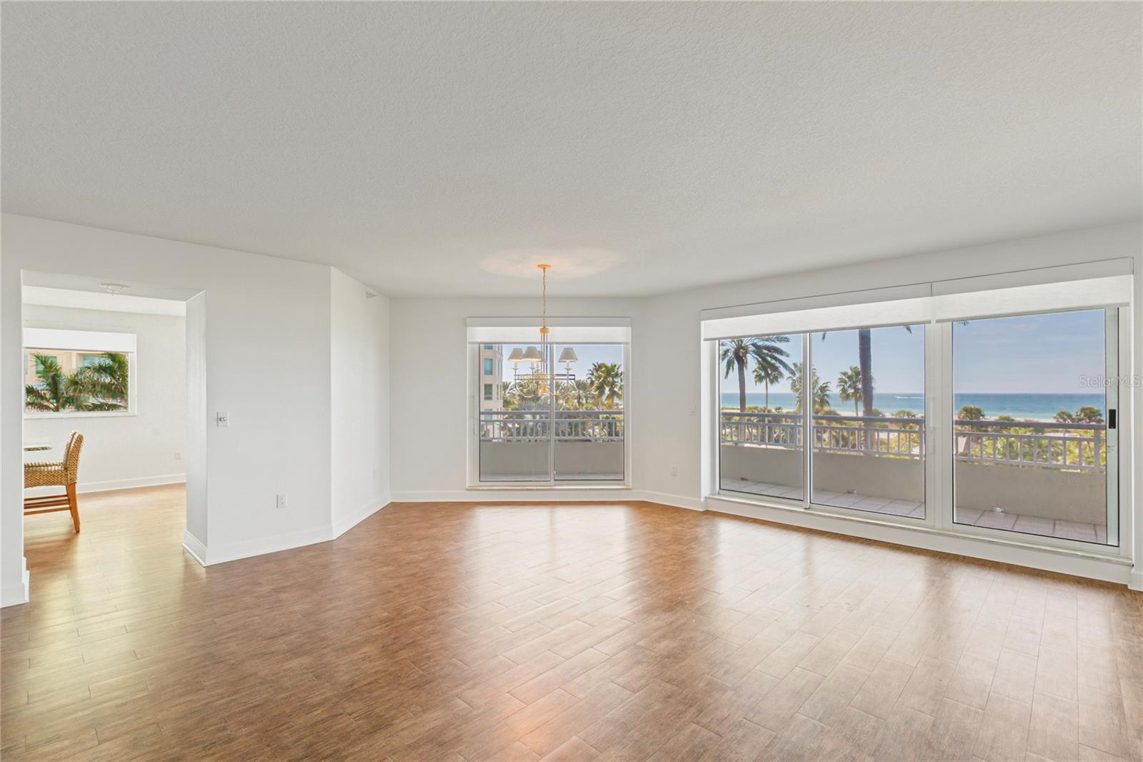 View of dining and Living area exiting the Primary Suite