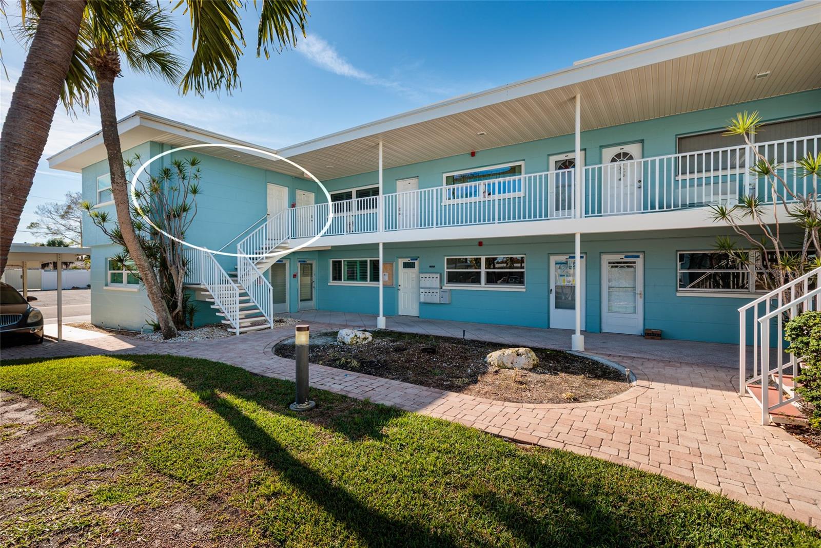 Unit 6 has 2 doors. Left is primary bedroom, right is main door.