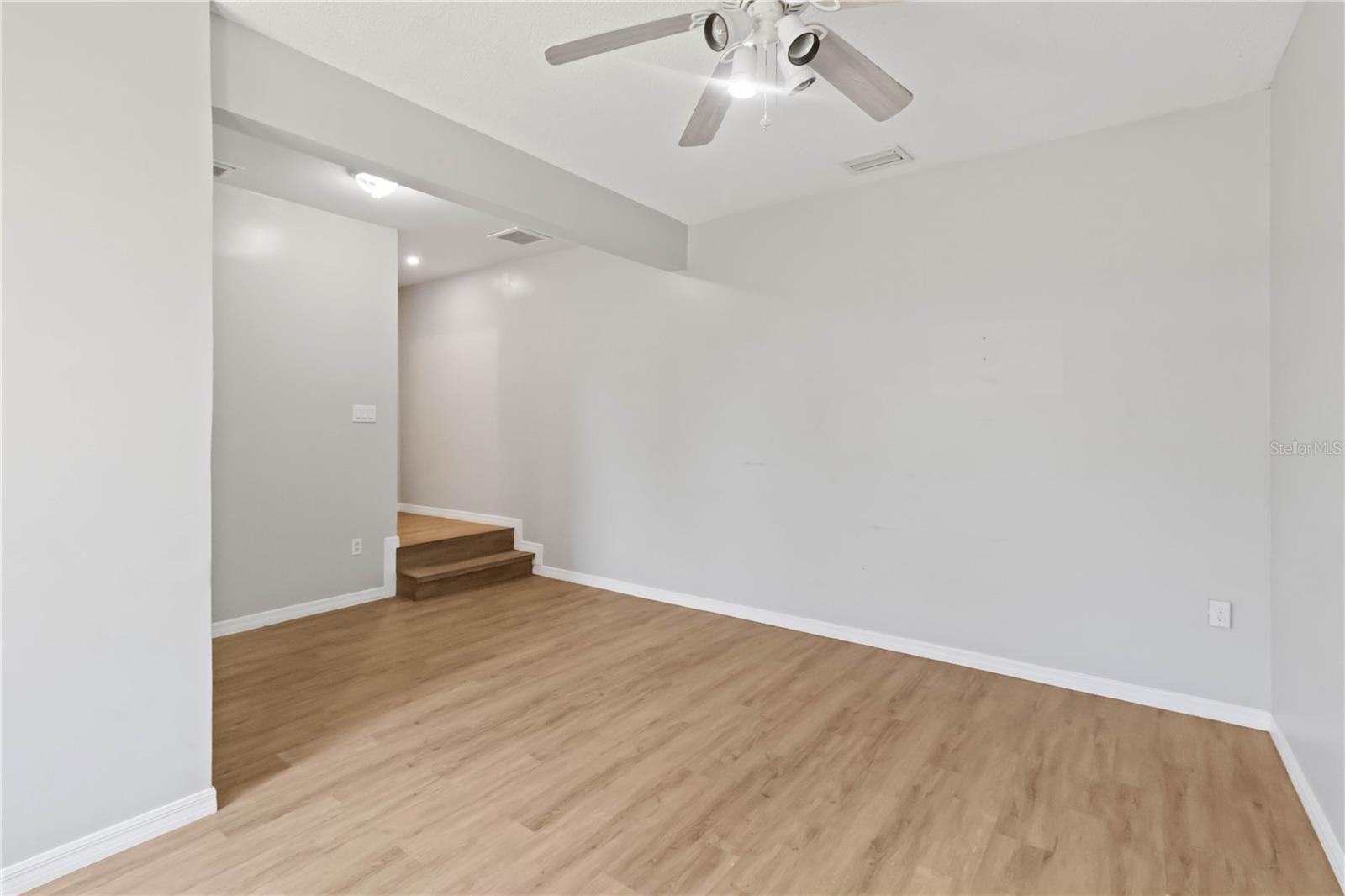 Bedroom #3 which was once the garage and can be converted back, if one desires.