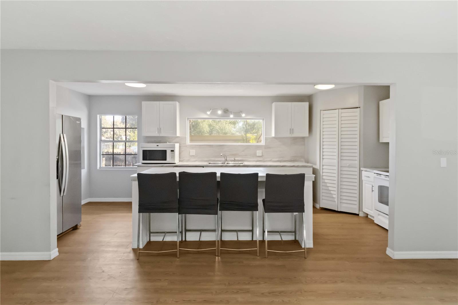 Family room view to kitchen