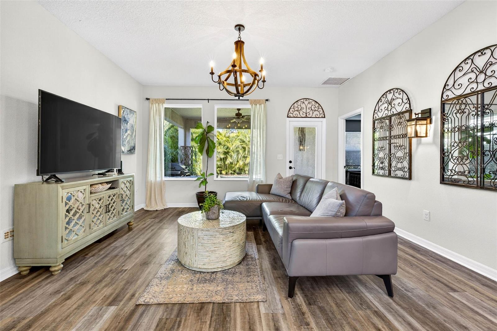 Living area off of dining area and kitchen make this the heart of the home.