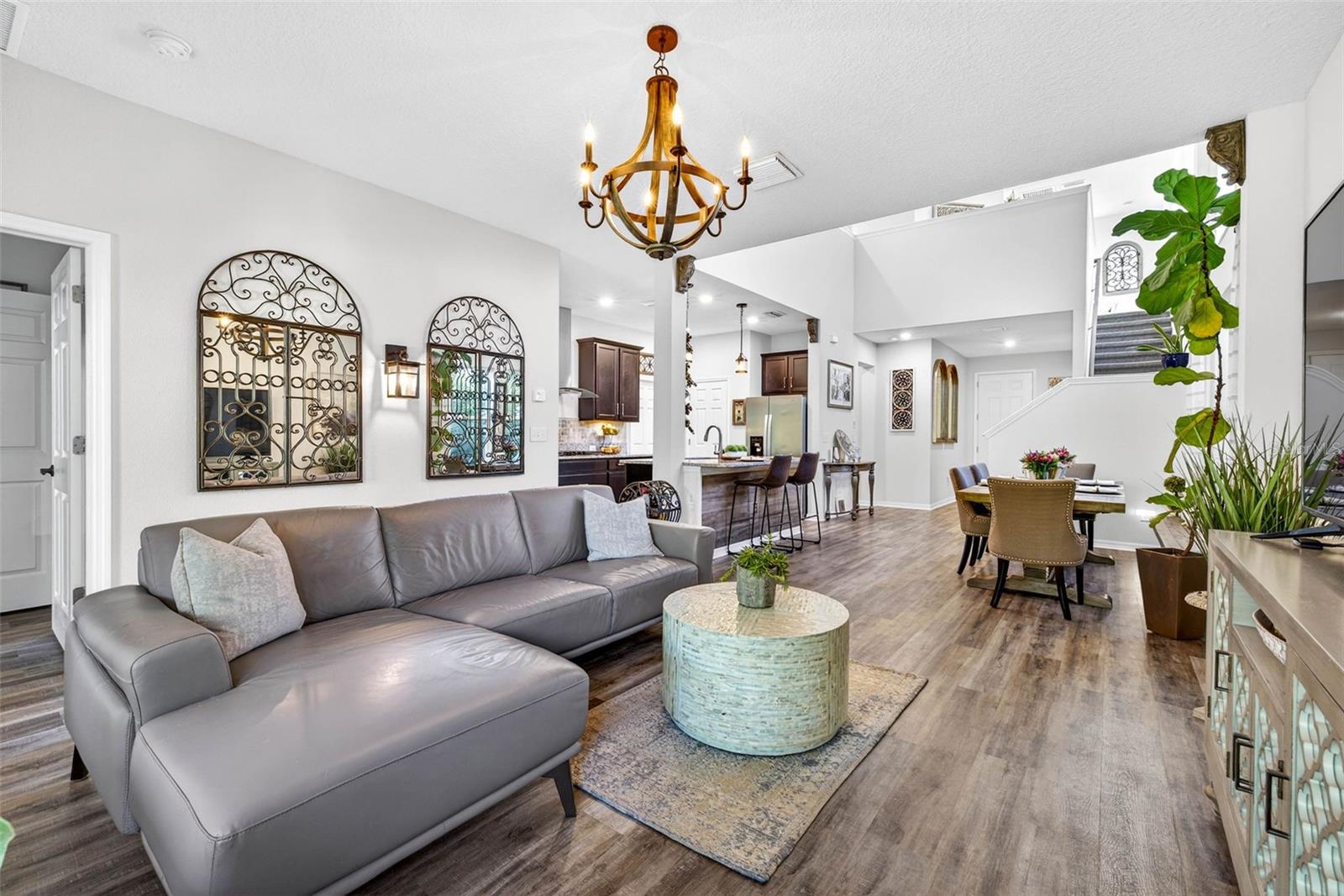 View from living area back towards kitchen and dining room.