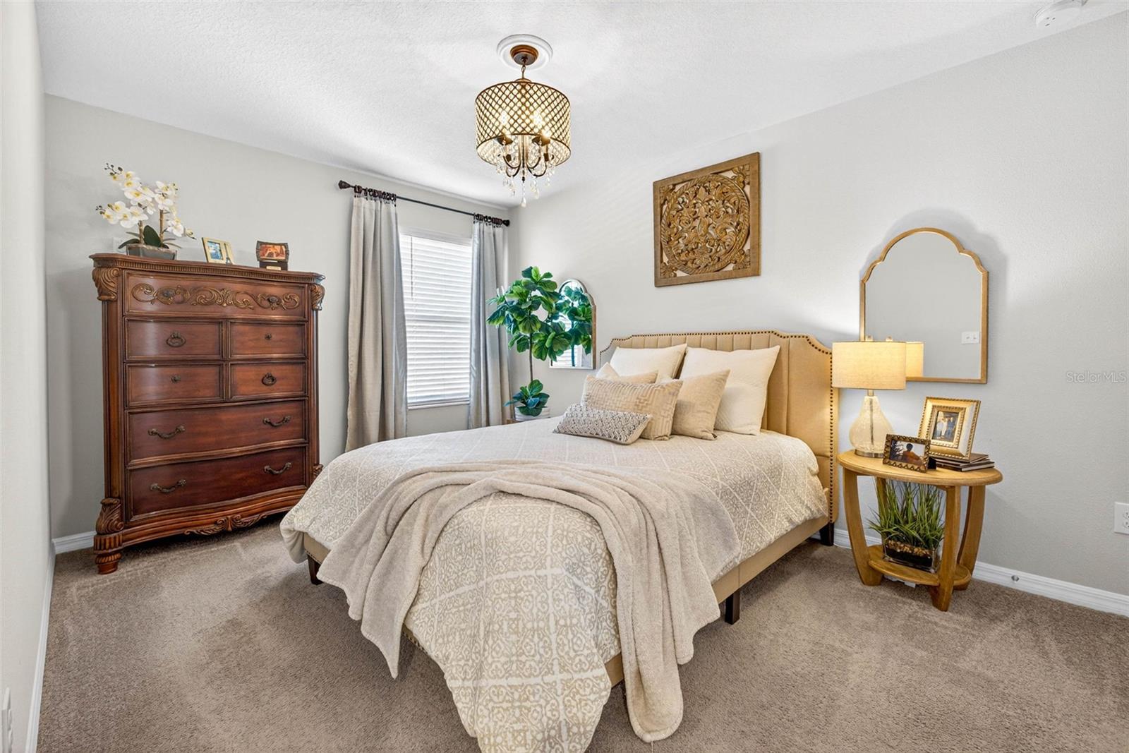 Secondary bedroom upstairs with built in closet