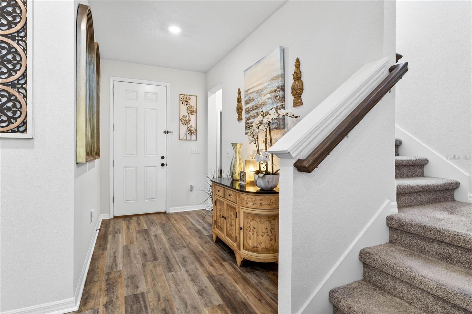 Foyer with front door