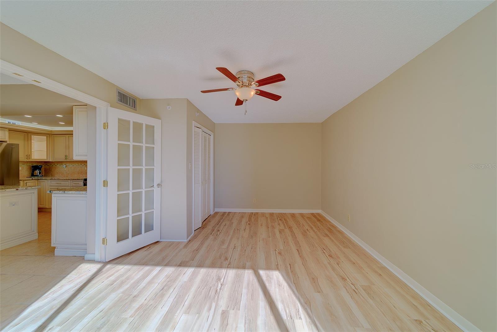 French door in bedroom 3 leading to kitchen