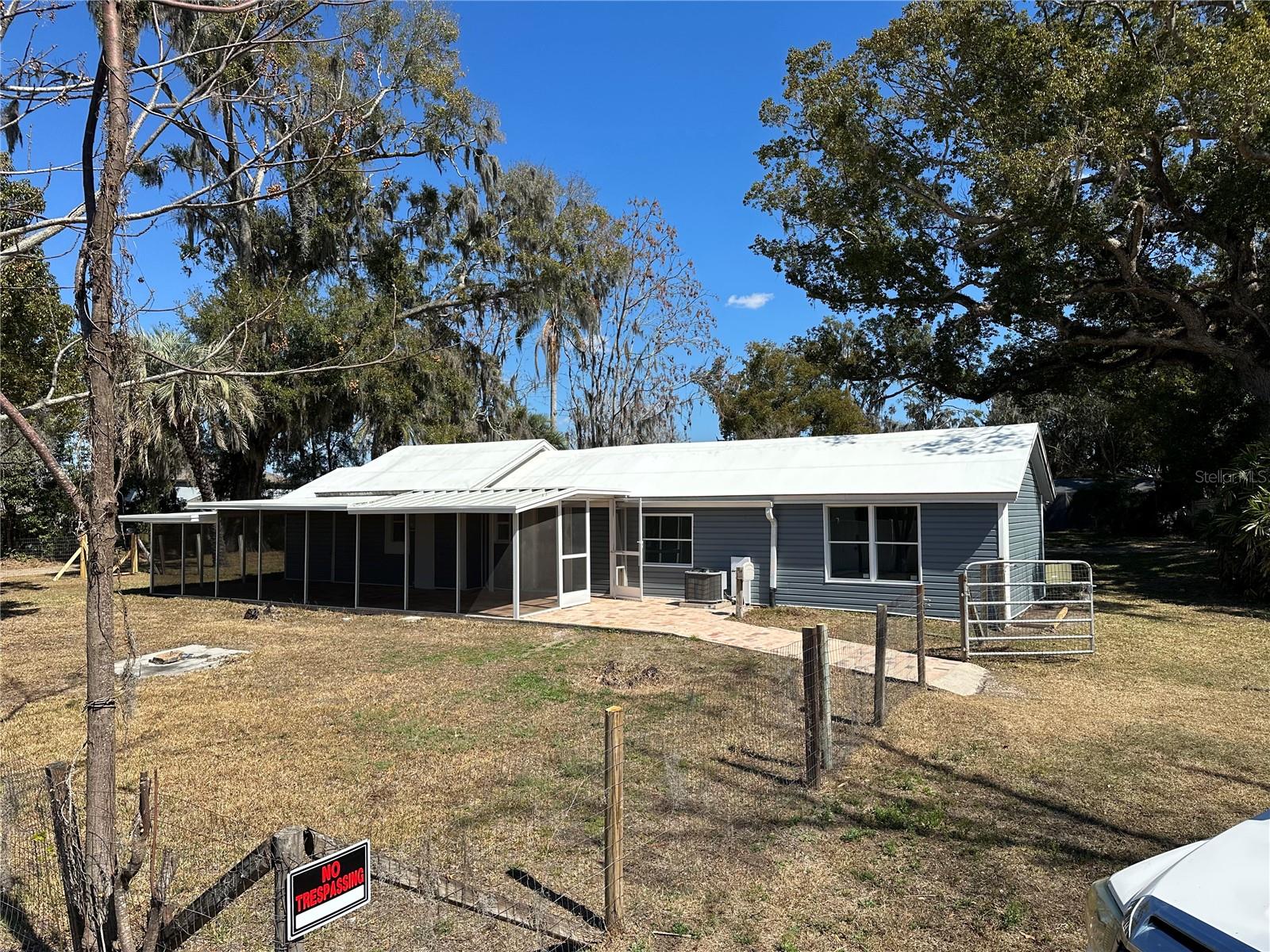 zoned agricultural with small fenced yard and dog door