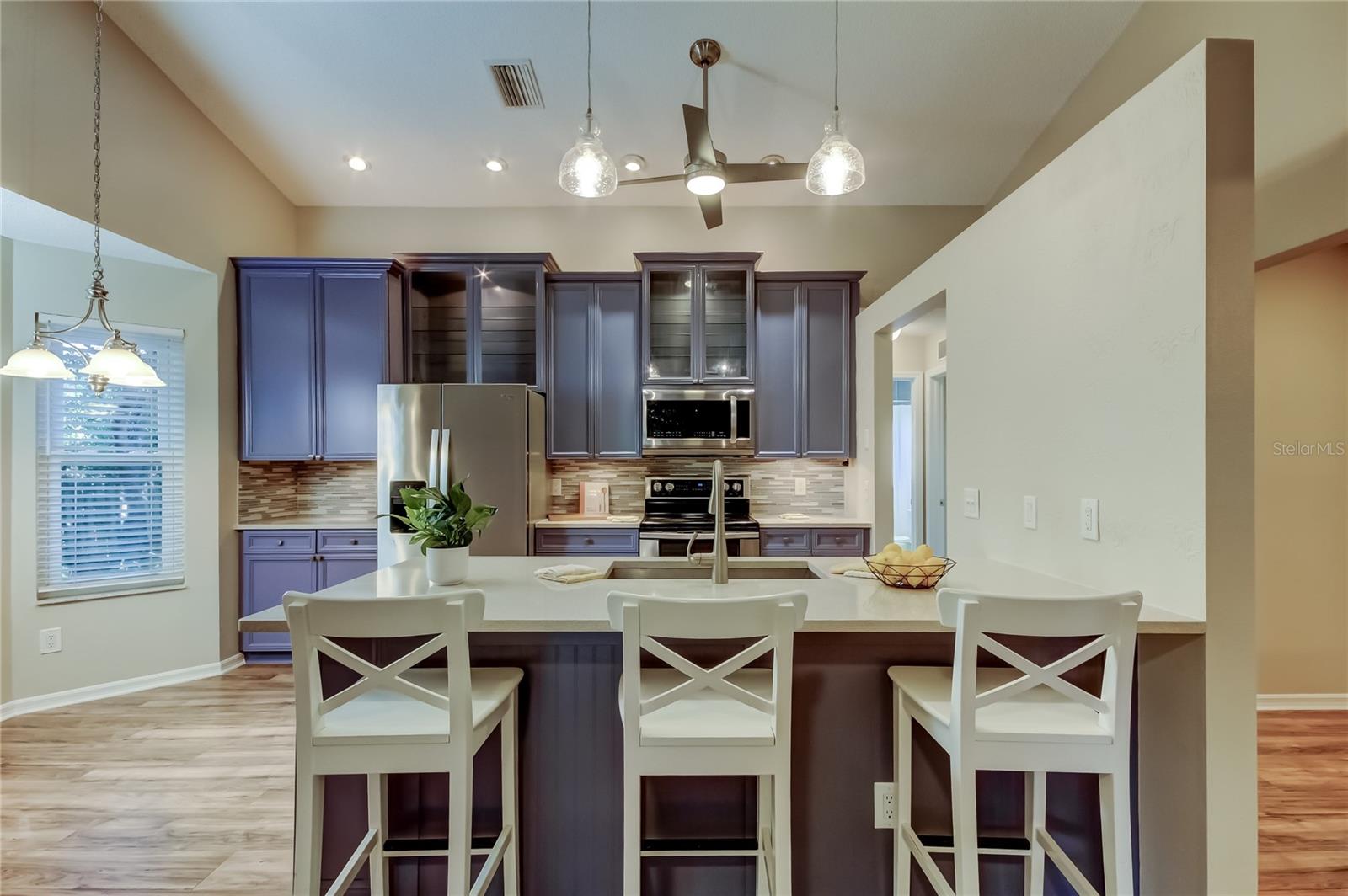 19. Kitchen is GRAND (11 ft x 15.6 ft) w 48in Tall Cabinets! Varied Heights Add Interest!