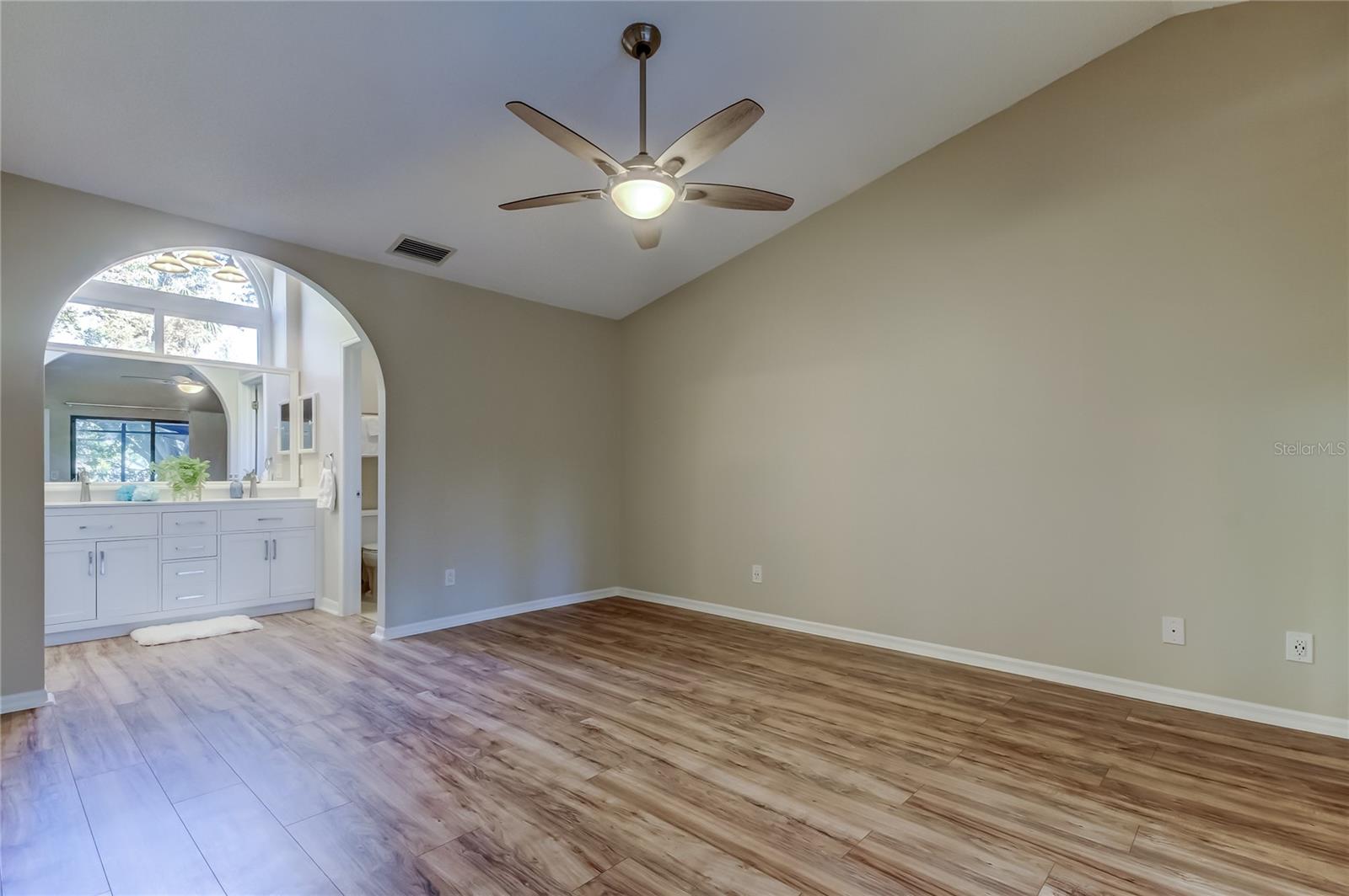 30. Primary Bed (12.7 ft x 15 ft) Off Great Room w Custom Arched Open Dual Vanity w Walk in Closet (5.10'x6.1')!