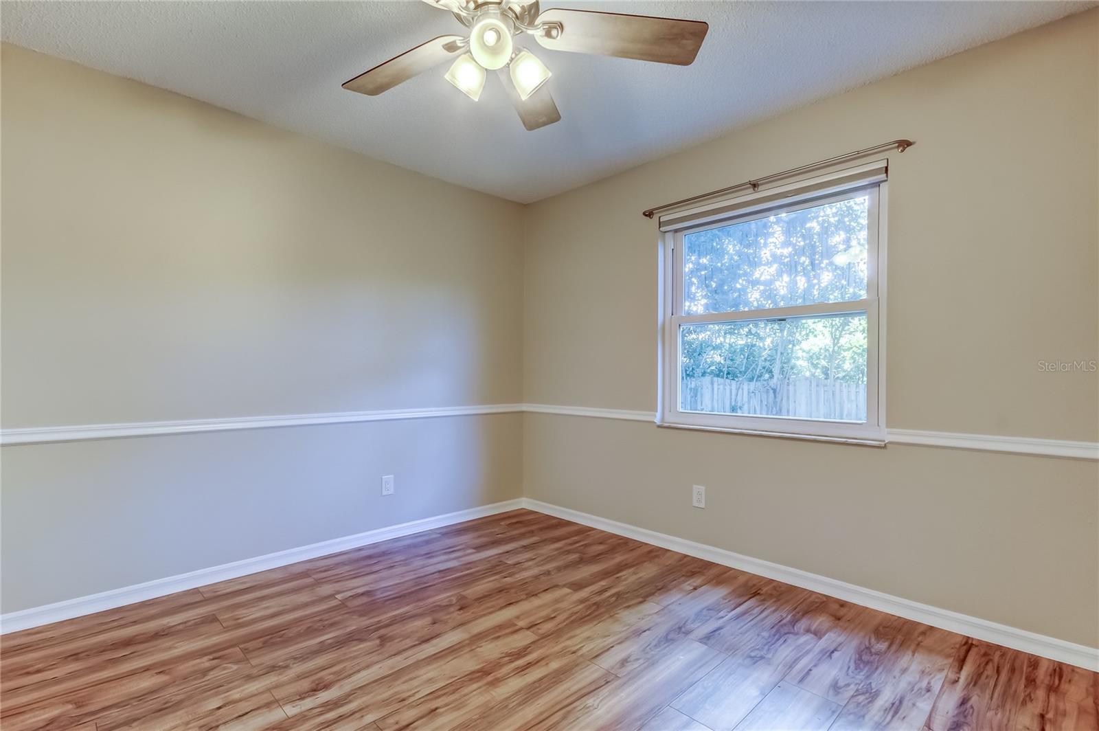 40. Opposite Side of Home, Behind Garage & Kitchen Area.. is Bedroom #3 (15.7 ft x 9.11 ft)!