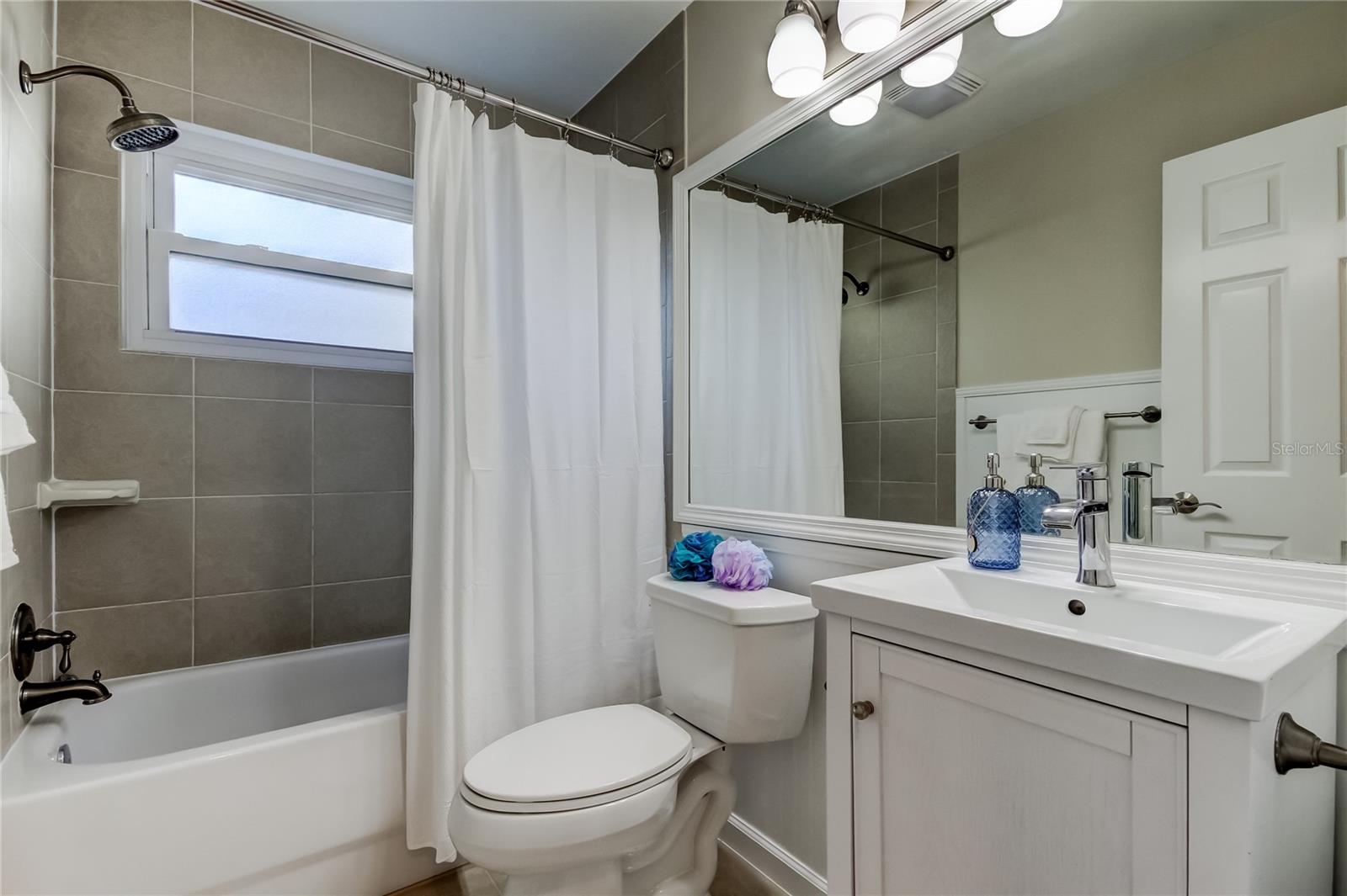 43. UPDATED Bathroom #2 (7.9 ft x 4.11 ft) is Flanked by Bedroom #2 & #3 .. Also Doubles as Guest Bath!!