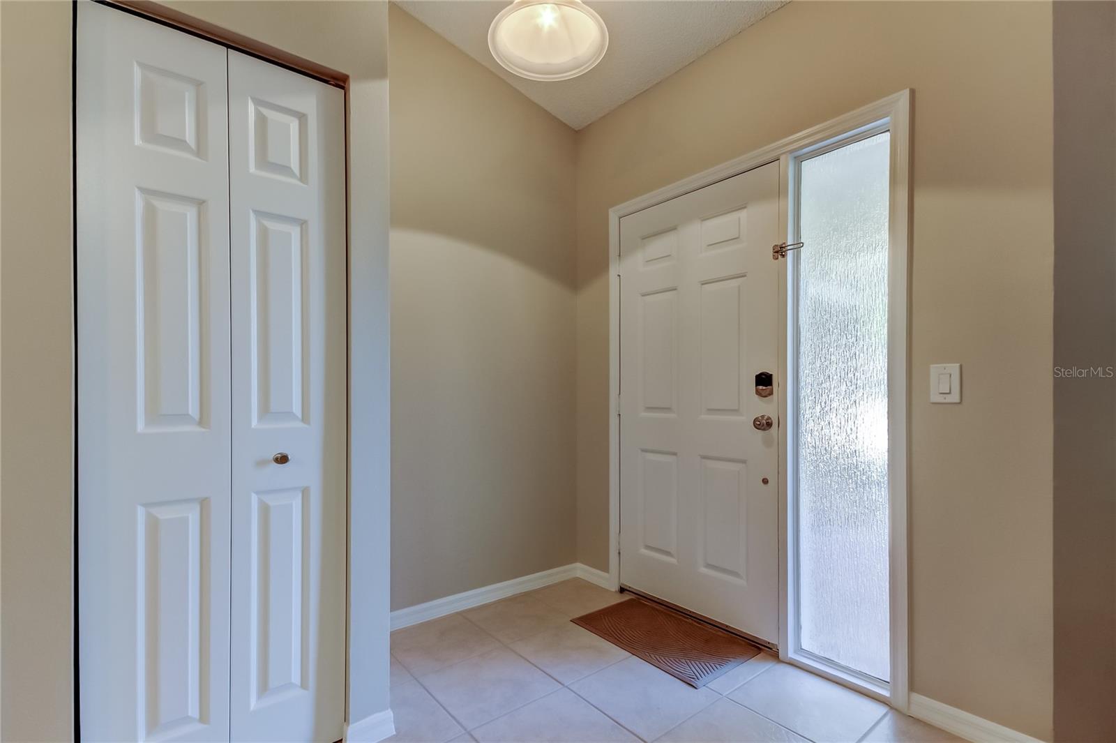 7. Foyer Area w Added Coat Closet & Tiled Inlet Keeps Floors Cleaner (7 ft x 7.1 ft)
