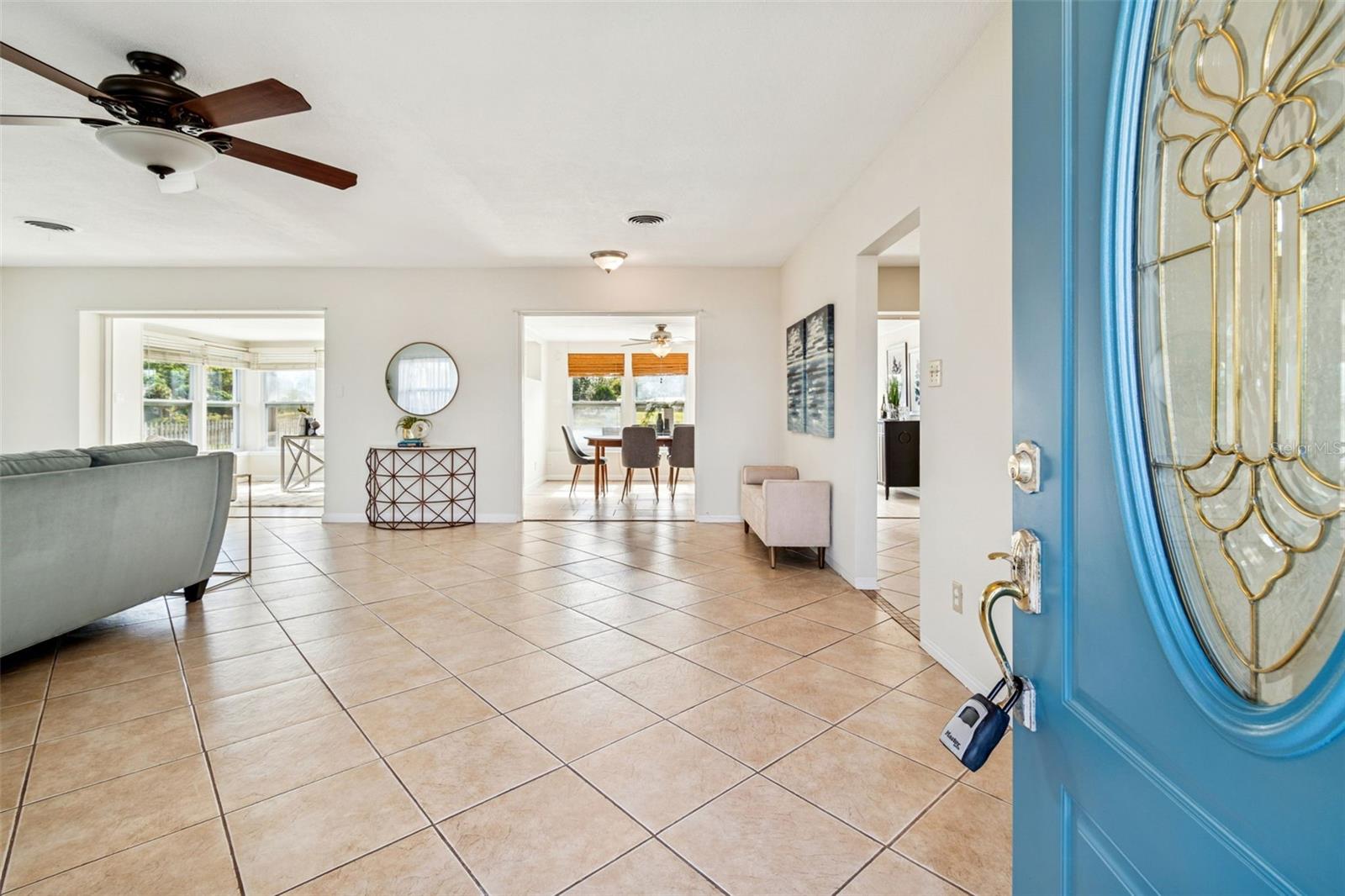 Natural light through the double-paned windows protected by electric hurricane shutters