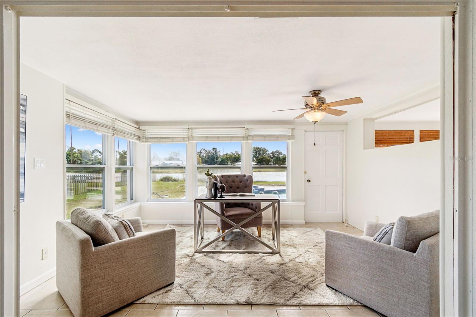 Florida room, office, game room, playroom....all with pool and lake views....you choose.