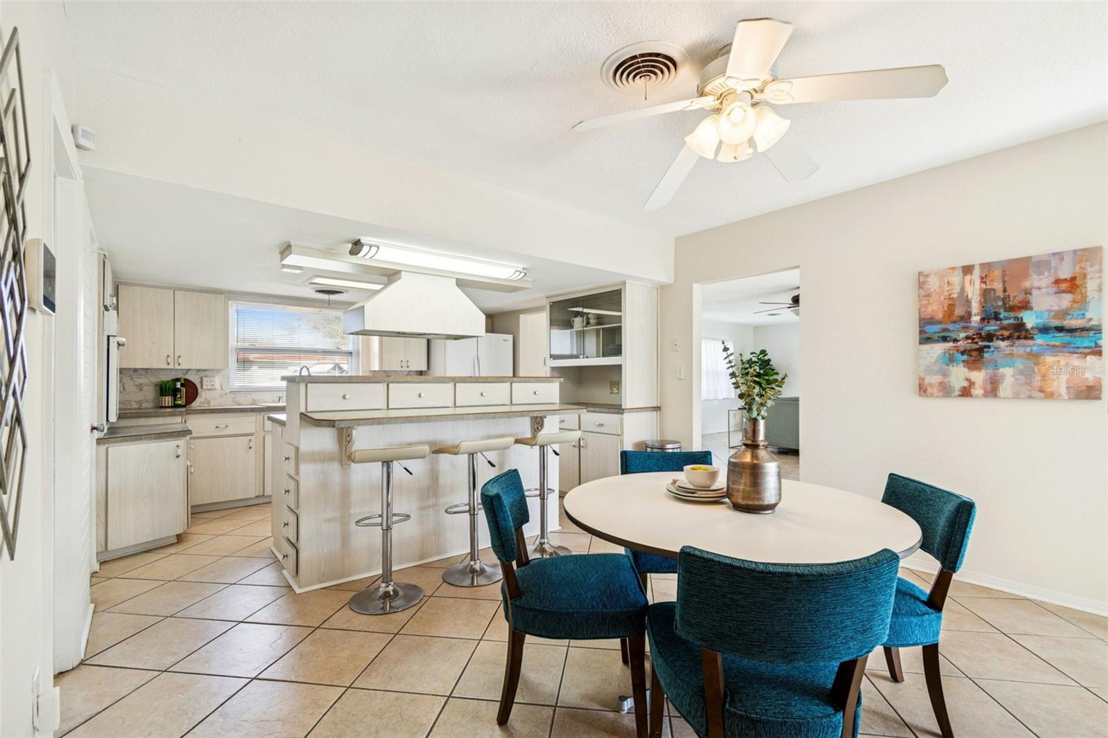 Culinary connection in eat-in area with pool/lake views