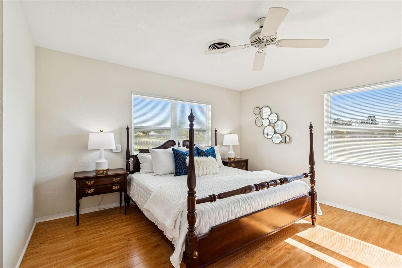 Primary suite with lake and pool views