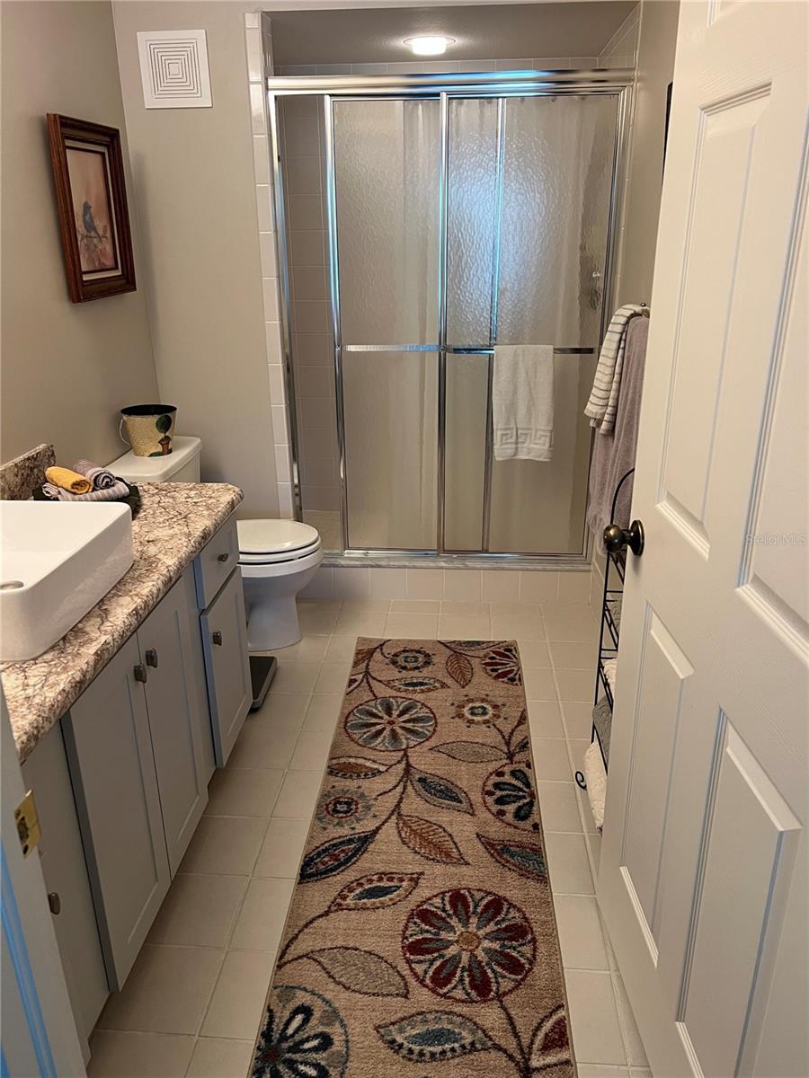 Master/Primary bath looking in from bedroom