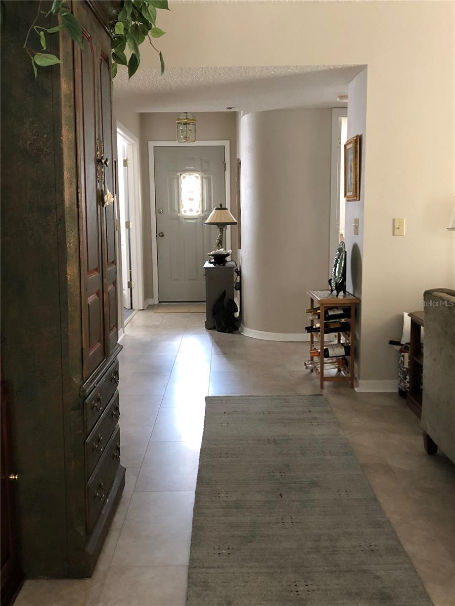 Foyer view from dining room looking at the front door!