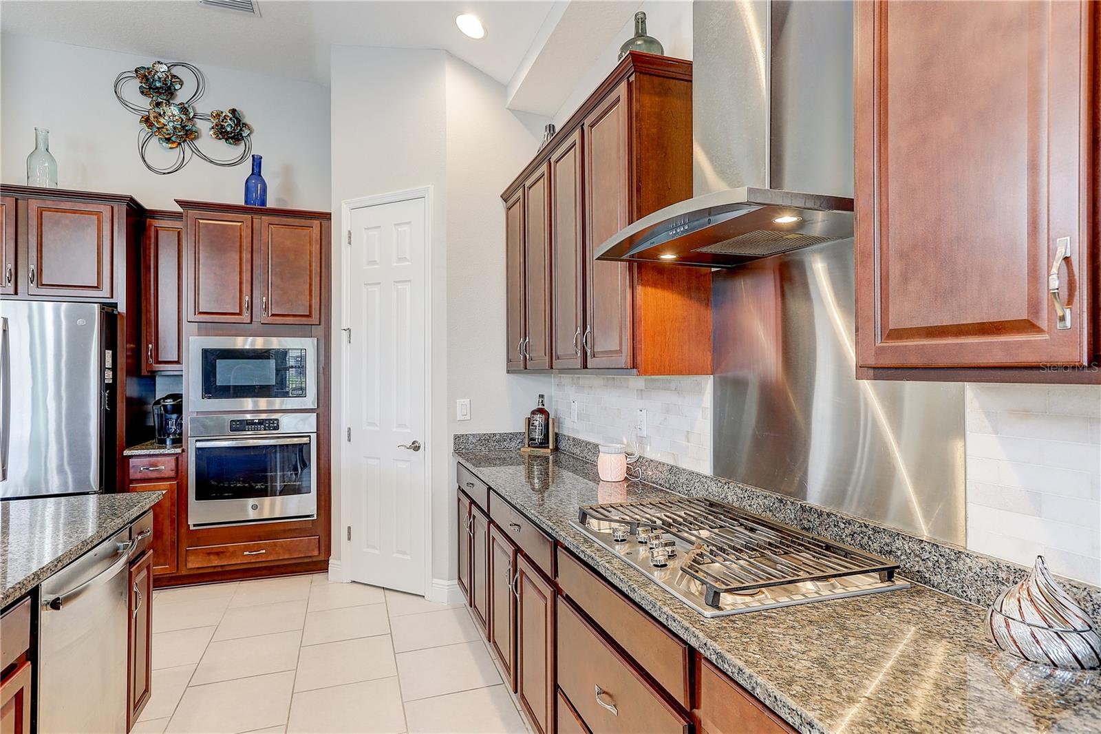 5 burner gas stove with a build-in microwave and convection oven