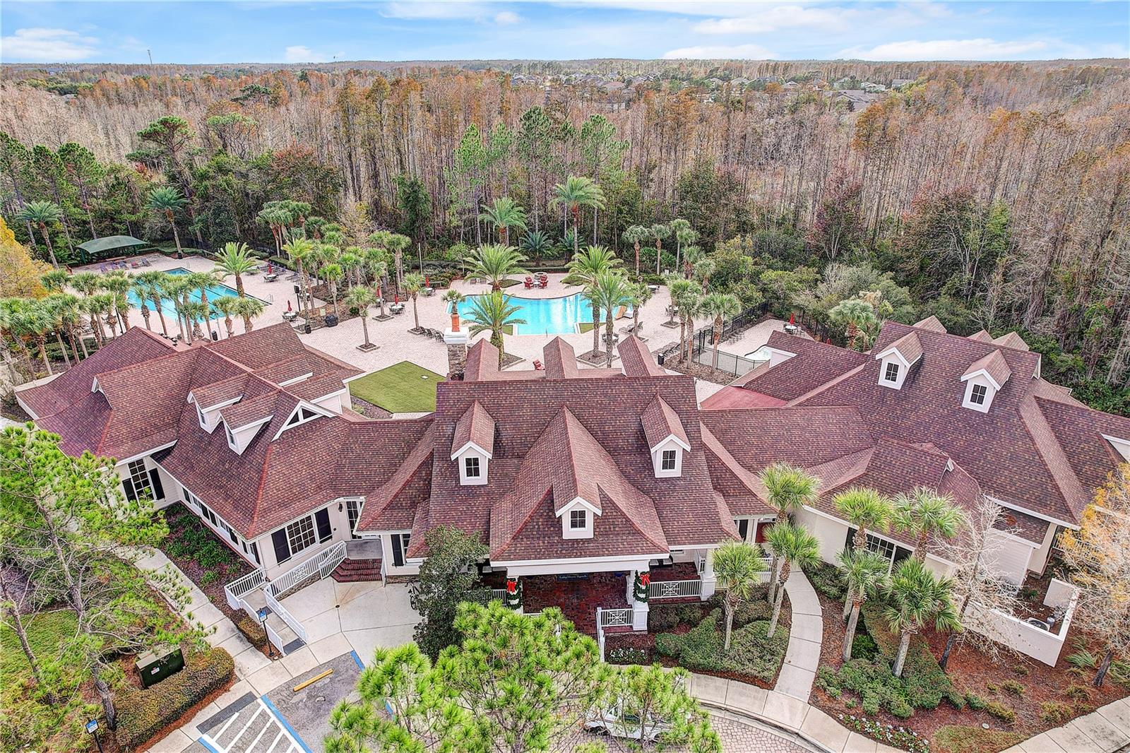Community clubhouse, fitness center, two pools, conference room, eating area, indoor kitchen for events, and resort-like views