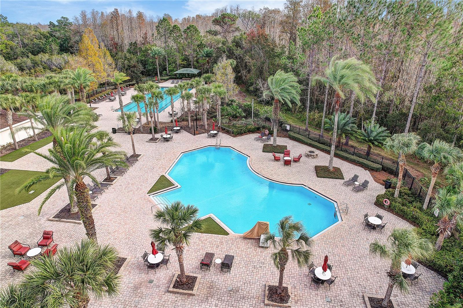 community pool with a separate hot tub