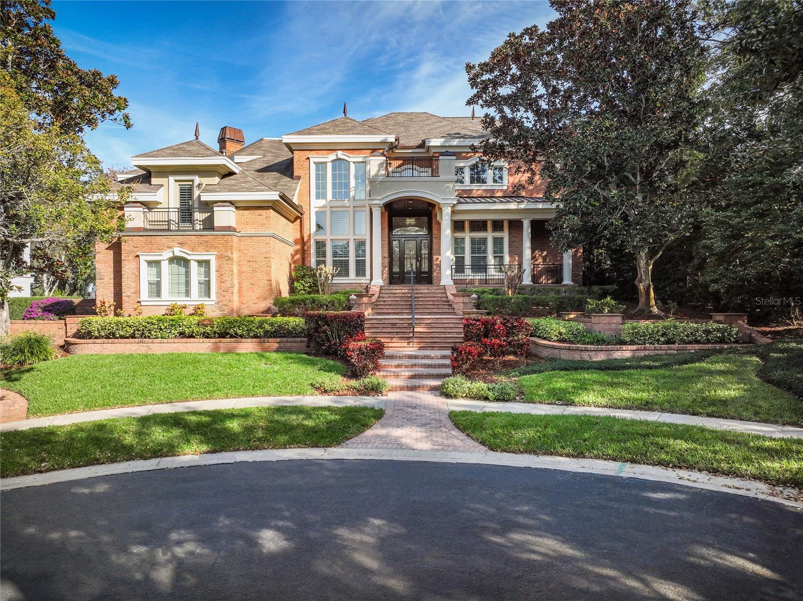 This stunning brick estate sits on .48 acres on the 12th Fairway of the Island Golf Course in Innisbrook Golf Resort. An exercise suite/in-law suite addition in 2017. New roof in 2017. Elevator to all levels. Generator. Oversized four car garage.