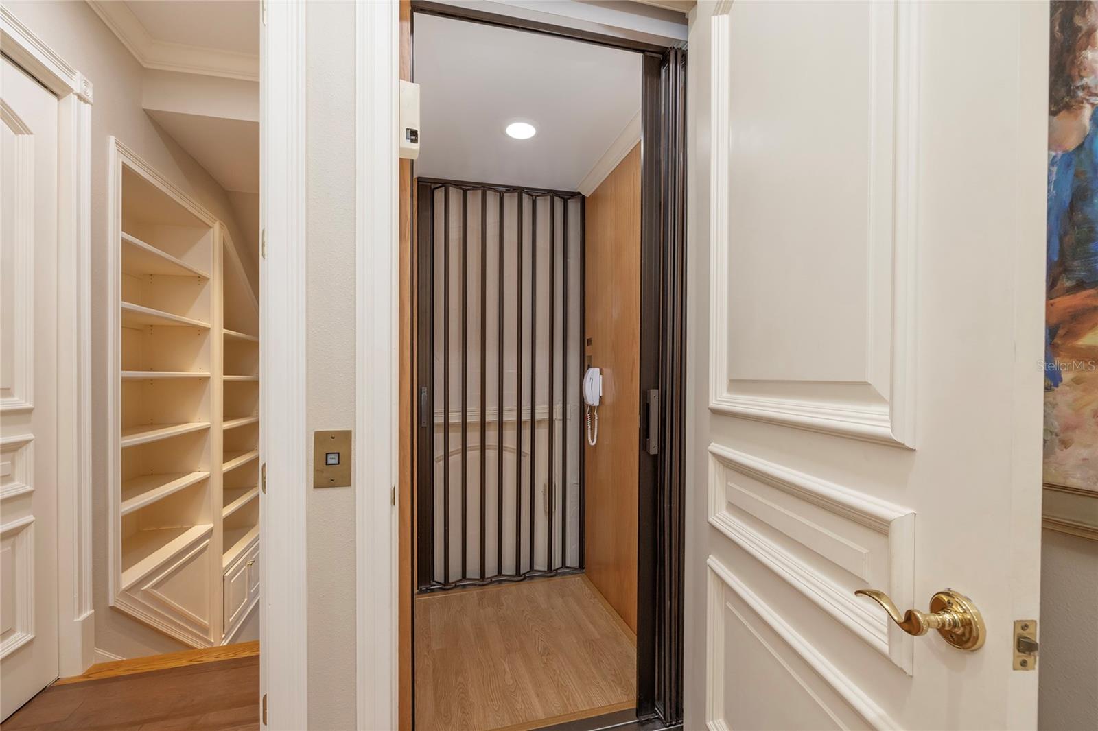 Elevator to ALL levels and can be accessed across from the double door entry to the Primary suite.